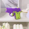 100033-979ea1.webp Mini Toy Gun with Luminous Transparent Shell
