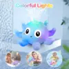 100122-dcb192.webp Electric Octopus Baby Bath Toy with Sprinkler, Music & LED Light