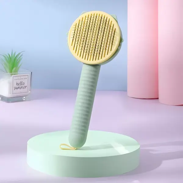 100898-d42941.webp Self-Cleaning Pet Brush