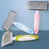 100953-767d49.webp Stainless Steel Dog Comb and Hair Remover Brush for Dogs & Cats
