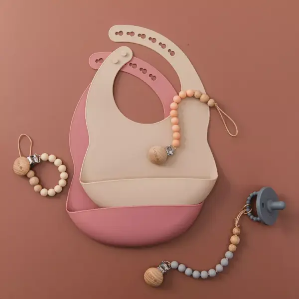 101922-d241b9.webp Waterproof Silicone Baby Bibs with Adjustable Neck and Crumb Catcher