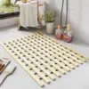 102304-93e84d.webp Eco-Friendly Bamboo Bath Mat
