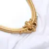 103193-3d3e69.webp Charming European Style Oval Wall Mirror