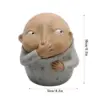 103197-c99dcb.webp Charming Resin Boy Nose-Plugging Sculpture