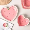 96461-a2ce7f.webp Charming Heart-Shaped Strawberry Ceramic Bowl