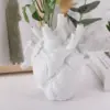 96491-6e3ce2.webp Heart-Shaped Anatomical Resin Vase