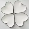96814-a4be4e.webp Chic Heart-Shaped Ceramic Plate