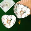 96869-d8ee5d.webp Charming Heart-Shaped Ceramic Plate for Romantic Dining & Dessert Presentation