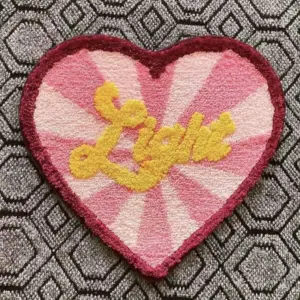 97329-e60e9a.webp Cozy Red Heart Fleece Rug
