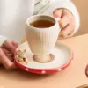 97875-56788a.webp Ceramic Mug with Saucer