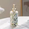 97906-95a49f.webp Elegant Ceramic Flower Soap Dispenser