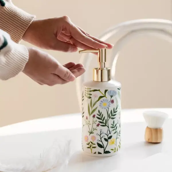 97906-b1eb5b.webp Elegant Ceramic Flower Soap Dispenser