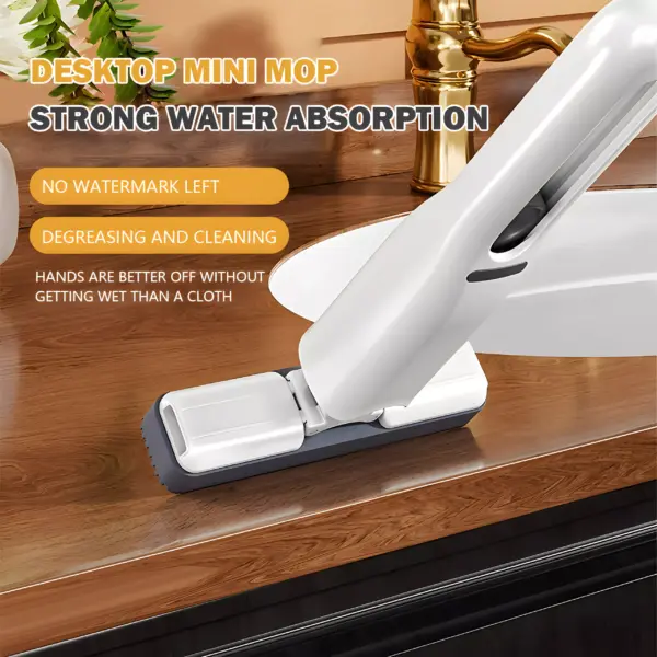 98008-fb4d5c.webp Mini Mop with Powerful Squeeze – Compact Folding Mop for Home, Car, Desk & Windows