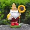 98121-7b7631.webp Adorable Sunflower Gnome Resin Statue