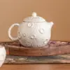 98669-eab95e.webp Gilded Silver Ceramic Teapot