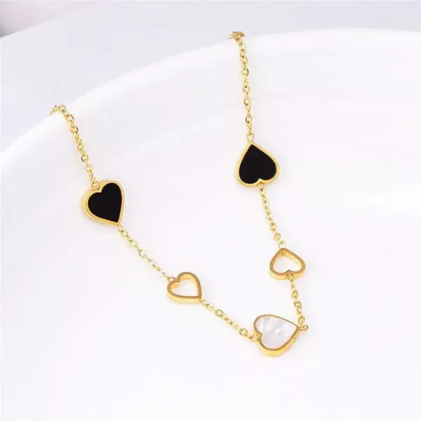 105747-05ea04.webp Heart Charm Stainless Steel Bracelet with Natural Seashell Embeds for Women