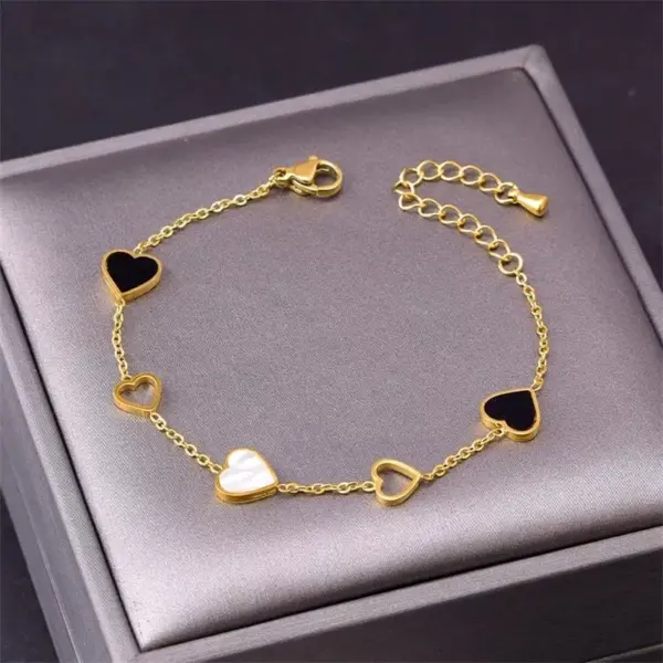 105747-3aee38.webp Heart Charm Stainless Steel Bracelet with Natural Seashell Embeds for Women