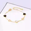 105747-4a86ae.webp Heart Charm Stainless Steel Bracelet with Natural Seashell Embeds for Women