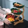 106406-effeed.webp Multi-Layer Fruit and Snack Organizer: Elegant Oval Shaped Kitchen Stand