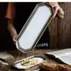 106446-0b039b.webp Kitchen Storage Tray: Nordic Light Luxury Ceramic Plate Organizer