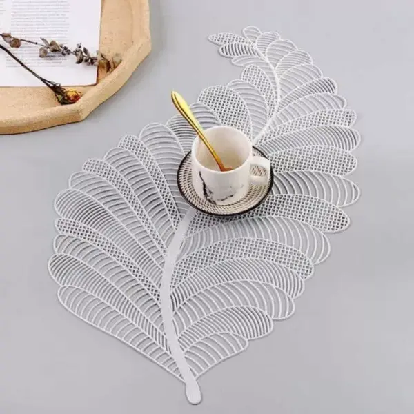 106794-109fa9.webp Elegant Nordic Leaf Design PVC Placemat - Water Resistant, Non-slip Kitchen Table Mat