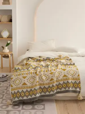 107053-46d35b.webp Bohemian Geometric Knitted Blanket