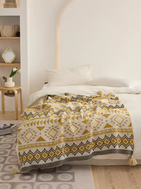107053-46d35b.webp Bohemian Geometric Knitted Blanket