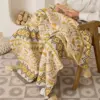 107053-70b35f.webp Bohemian Geometric Knitted Blanket