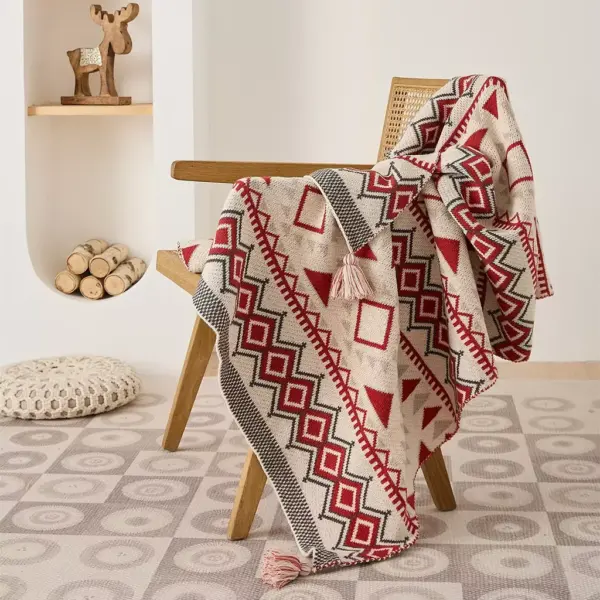 107053-86d4b2.webp Bohemian Geometric Knitted Blanket