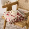 107053-dbc9d3.webp Bohemian Geometric Knitted Blanket