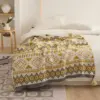 107053-e490b5.webp Bohemian Geometric Knitted Blanket