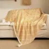 107056-73a3a4.webp Luxury Tassel Knitted Throw Blanket