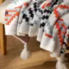107059-5af192.webp Bohemian Nordic Knitted Blanket