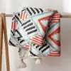 107059-703a64.webp Bohemian Nordic Knitted Blanket
