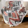107059-d51bd4.webp Bohemian Nordic Knitted Blanket