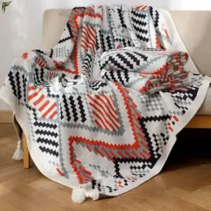 107059-d51bd4.webp Bohemian Nordic Knitted Blanket