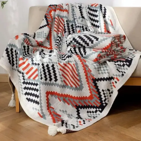 107059-d51bd4.webp Bohemian Nordic Knitted Blanket