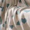 107060-27f7b7.webp Cozy Knitted Love Sofa Blanket