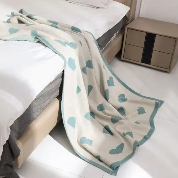 107060-475722.webp Cozy Knitted Love Sofa Blanket