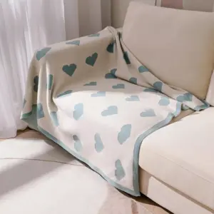 107060-aa0e52.webp Cozy Knitted Love Sofa Blanket