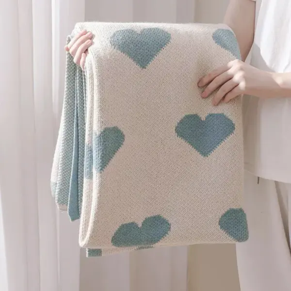 107060-f388dd.webp Cozy Knitted Love Sofa Blanket