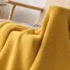 107120-f5e57b.webp Mustard Yellow Luxury Knit Throw Blanket with PomPom Tassels