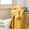 107120-fbeeb7.webp Mustard Yellow Luxury Knit Throw Blanket with PomPom Tassels