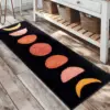 107453-f4eaee.webp Cloud-Soft Moon Patterned Anti-Skid Bedside Carpet