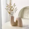 107459-c6de60.webp Contemporary Abstract Ceramic Vase