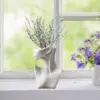 107504-da76ef.webp European Ceramic Face Vase