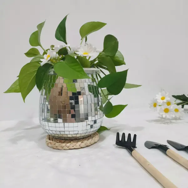 107506-c3f05f.webp Bohemian Chic Self-Watering Disco Ball Planter