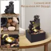 107852-96c535.webp Tranquil Tabletop Waterfall Fountain with Soft LED Lights and Natural Ambience